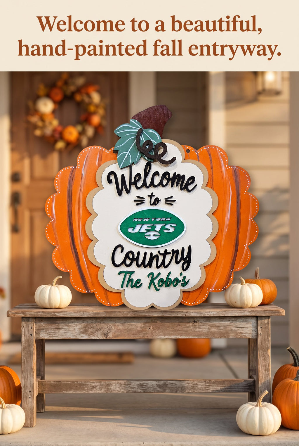 A decorative fall-themed sign reading 'Welcome to Country The Kobos' with a New York Jets logo, displayed on a rustic wooden bench in a warmly lit entryway with pumpkins and autumn decor.