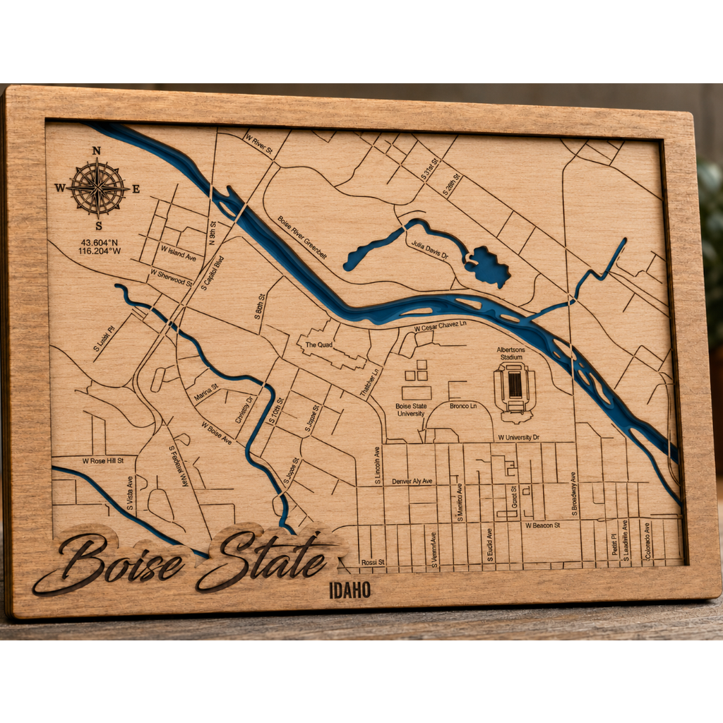 Wooden plaque with laser-cut map of Boise, Idaho, engraved with 'Boise State' and 'Idaho'.