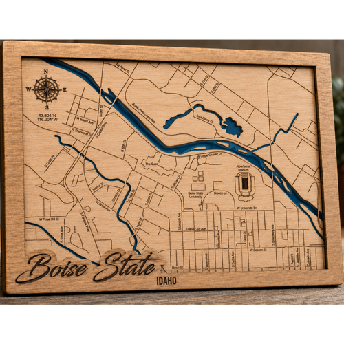 Wooden plaque with laser-cut map of Boise, Idaho, engraved with 'Boise State' and 'Idaho'.
