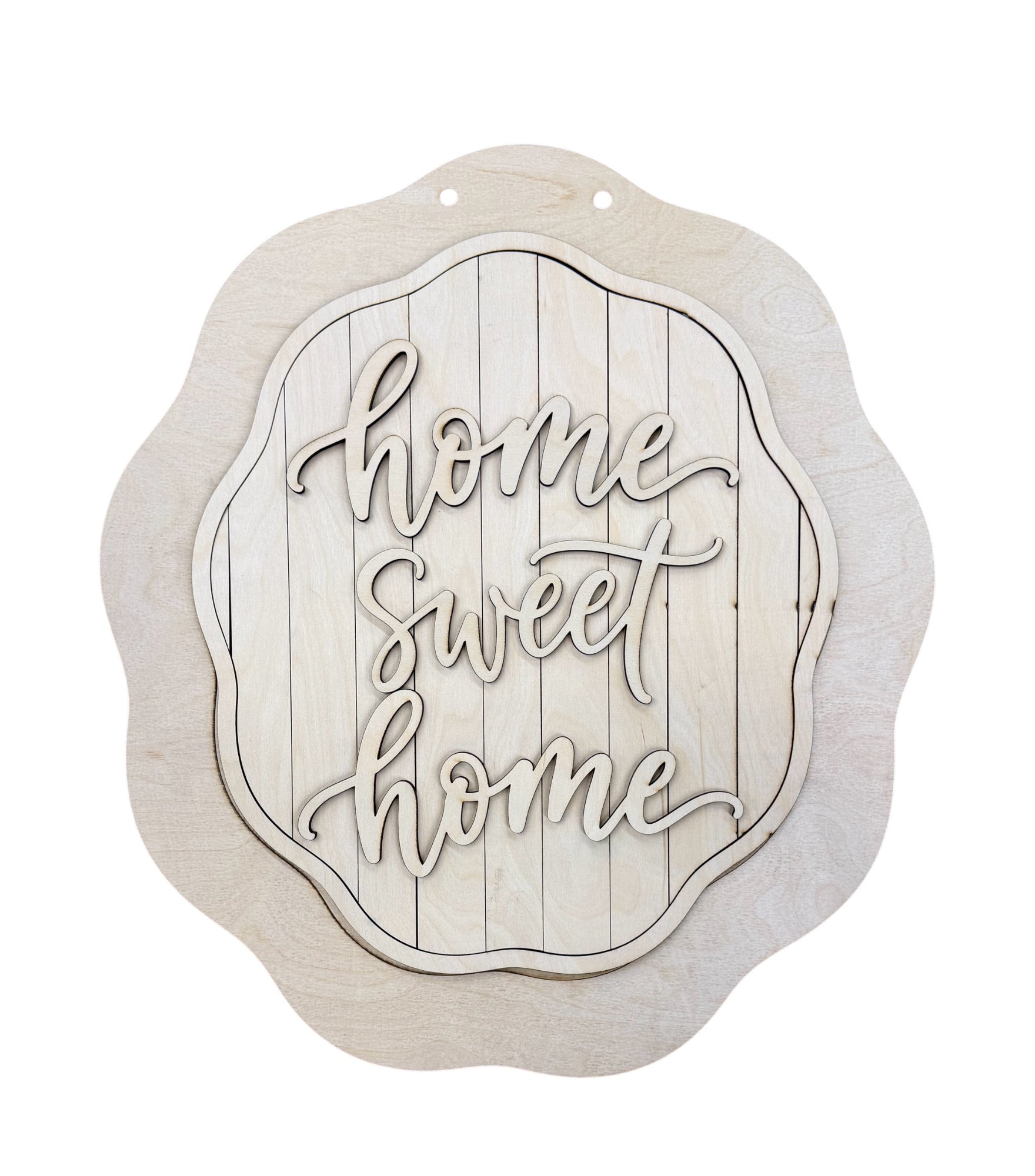 An unfinished light wood decorative wall sign with the phrase 'home sweet home' in raised script over a vertical plank design, shown on a plain white background.