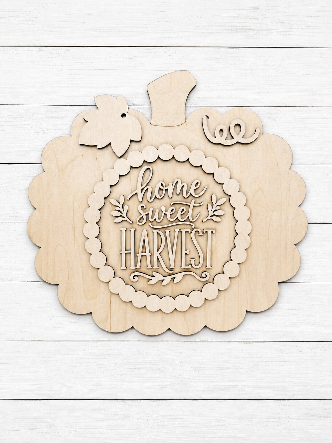 Home Sweet Harvest pumpkin-shaped laser cut wood sign with scalloped border and beaded ring, unfinished Baltic birch, 16 inch