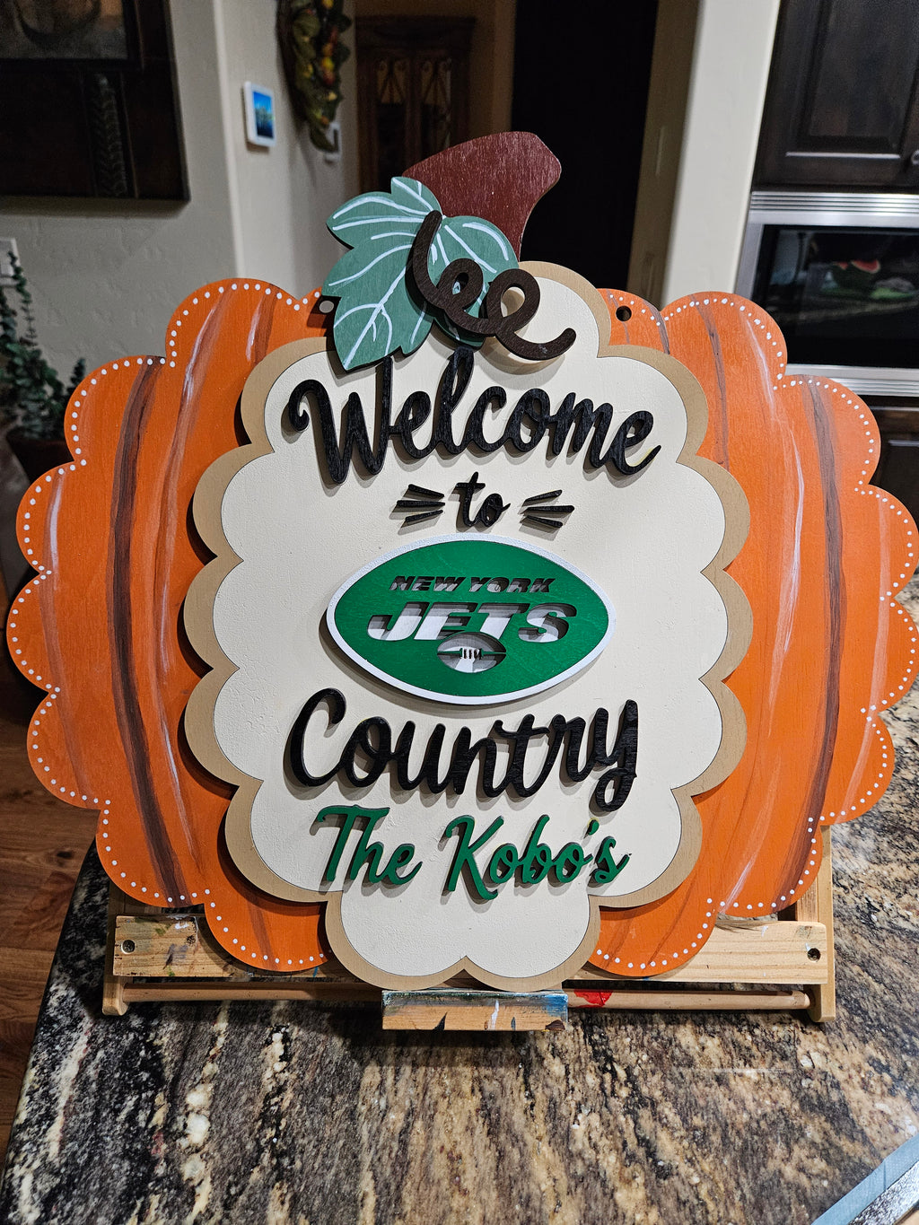 Custom team pumpkin welcome sign — laser-cut wood with personalized family name