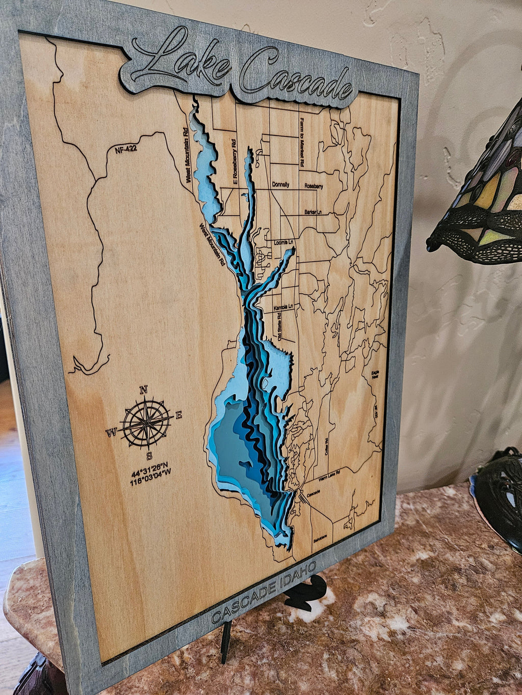 Custom laser cut wood map art close-up showing wood layer detail
