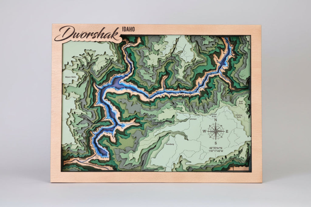 Topographic map with river illustration on a wooden board